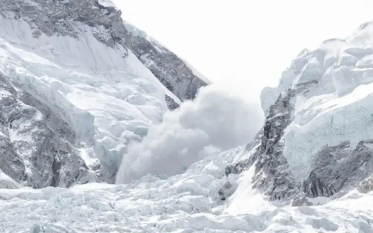 Avalanche debris cloud rising through the Khumbu Icefall