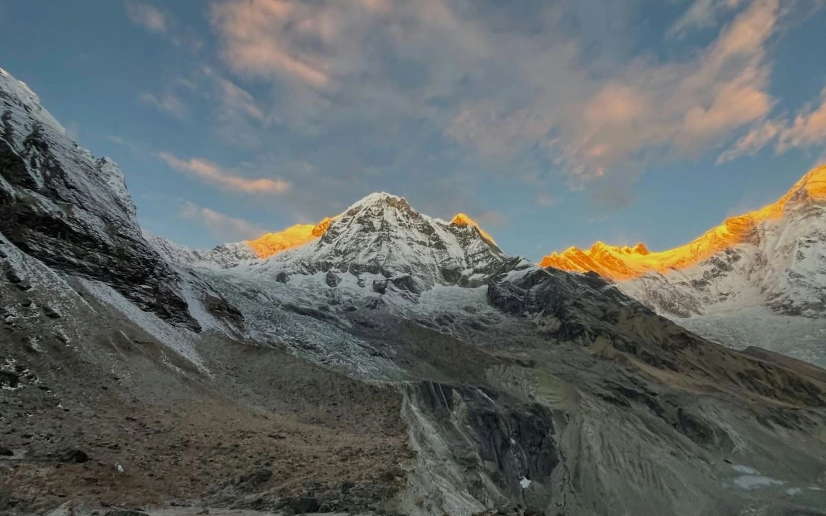 Sunrise alpenglow on Annapurna peaks from Annapurna Base Camp
