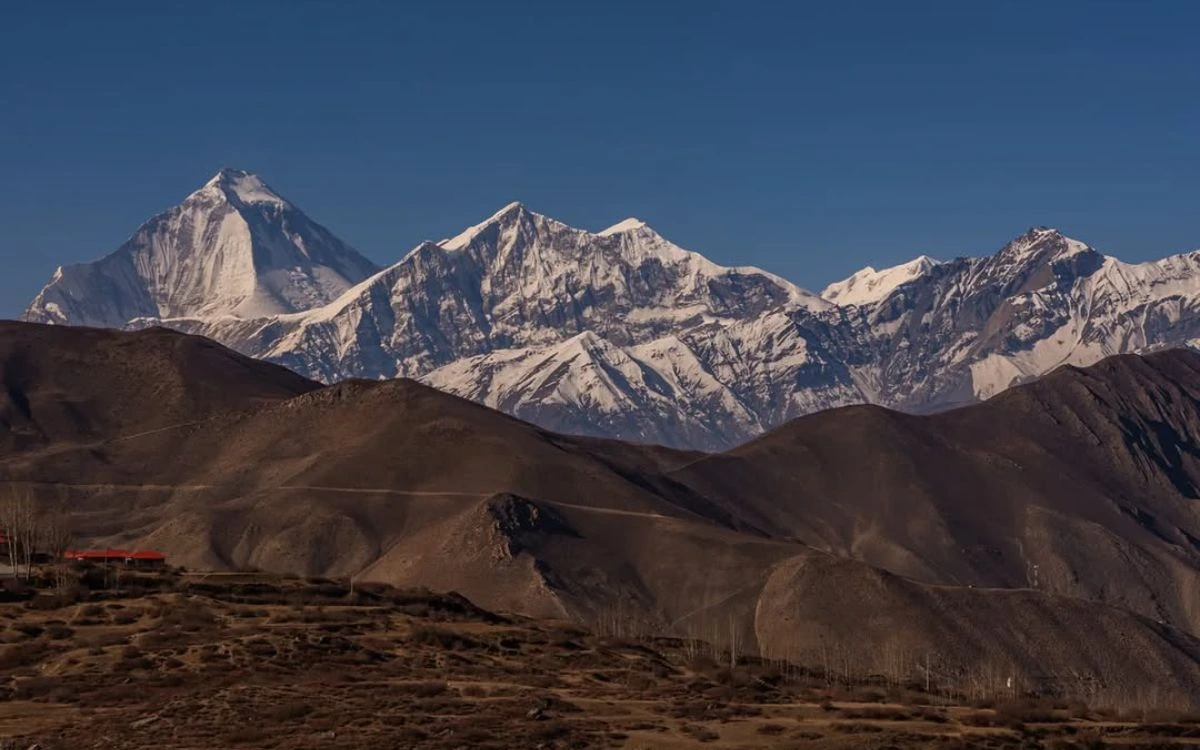 Annapurna Conservation Area - Dramatic view of Annapurna mountain range with barren foothills