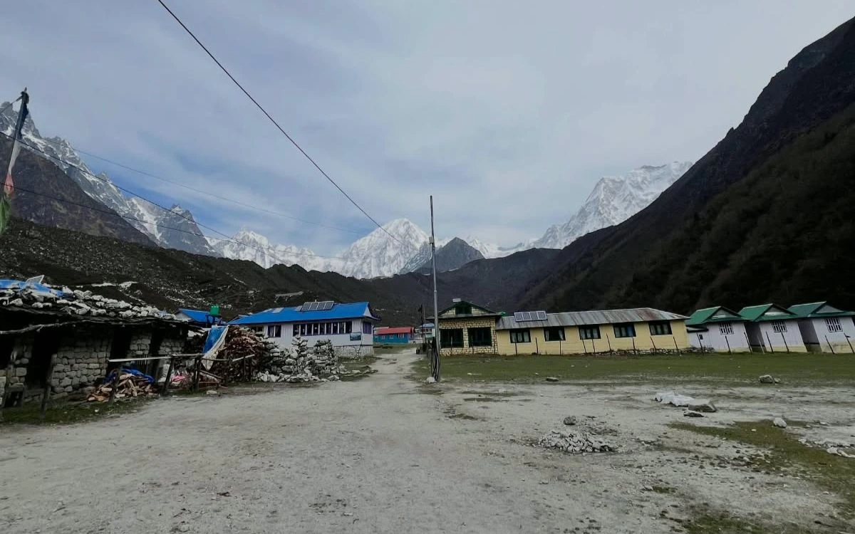 Bimthang valley lodges with snow peaks on the Manaslu Circuit Trek