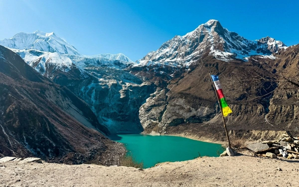 urquoise Birendra Lake viewpoint below Manaslu Circuit peaks