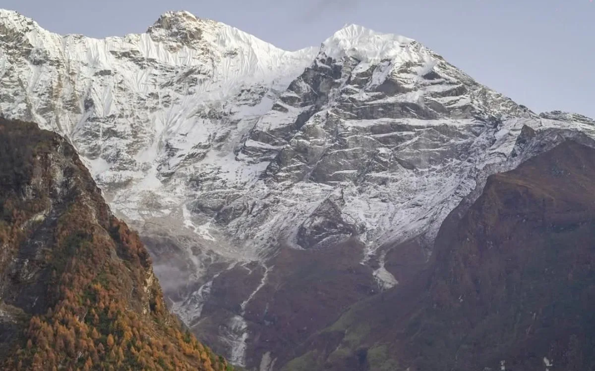 Tamang Heritage Trail mountain stream valley with Himalayan peaks Nepal