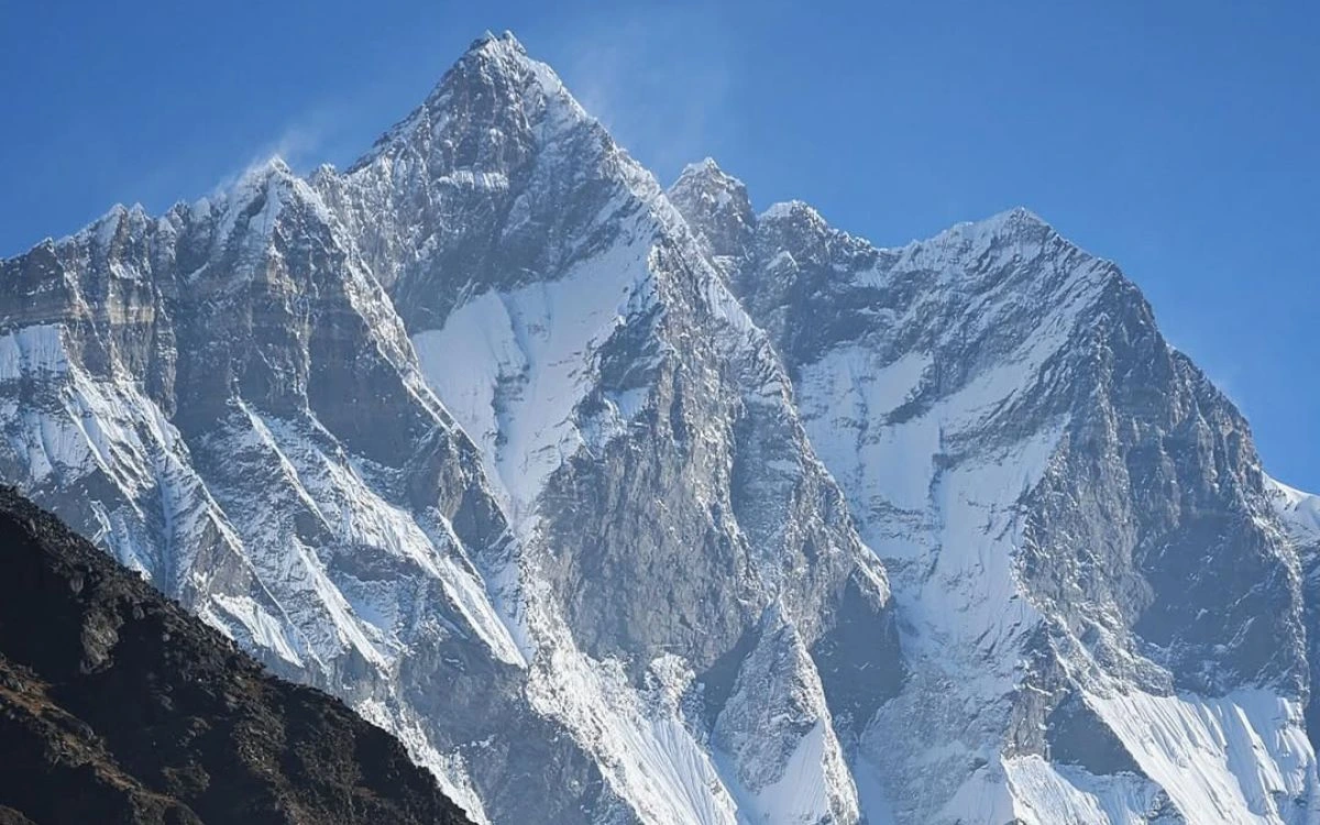 Mount Lhotse view from Dingboche with snow-covered peak and rocky foothills