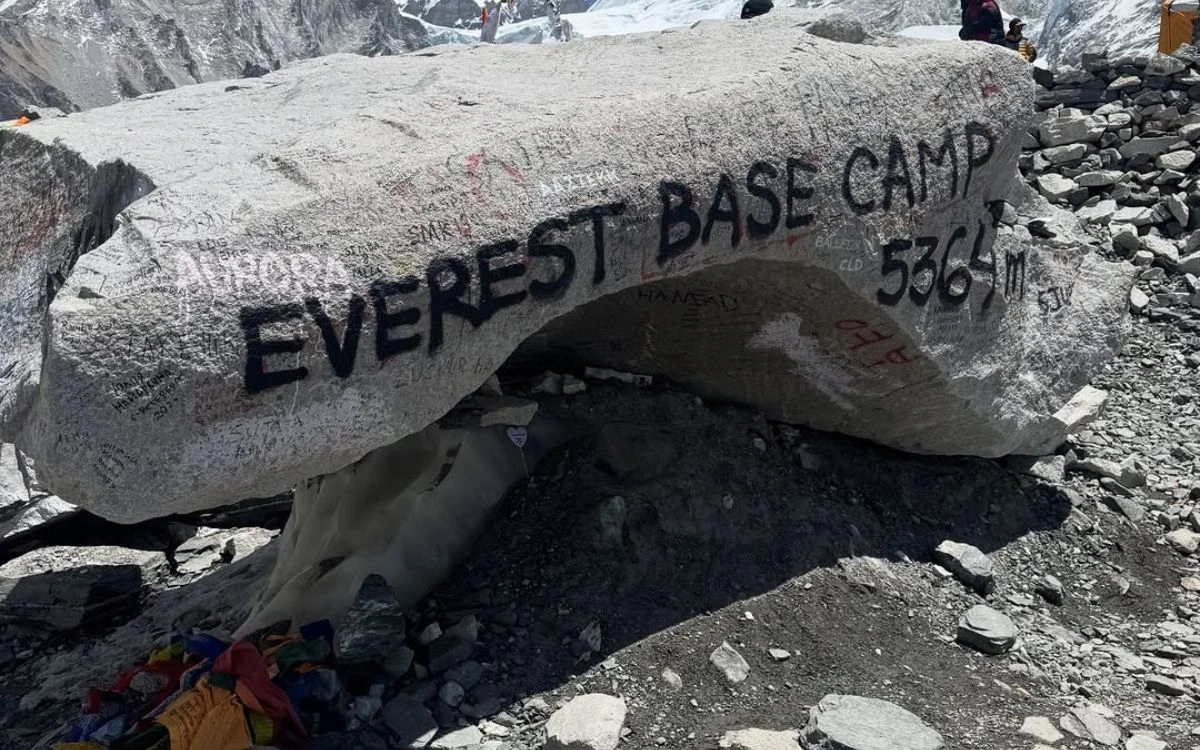 The iconic Everest Base Camp boulder painted with the altitude 5,364m on the Khumbu Glacier