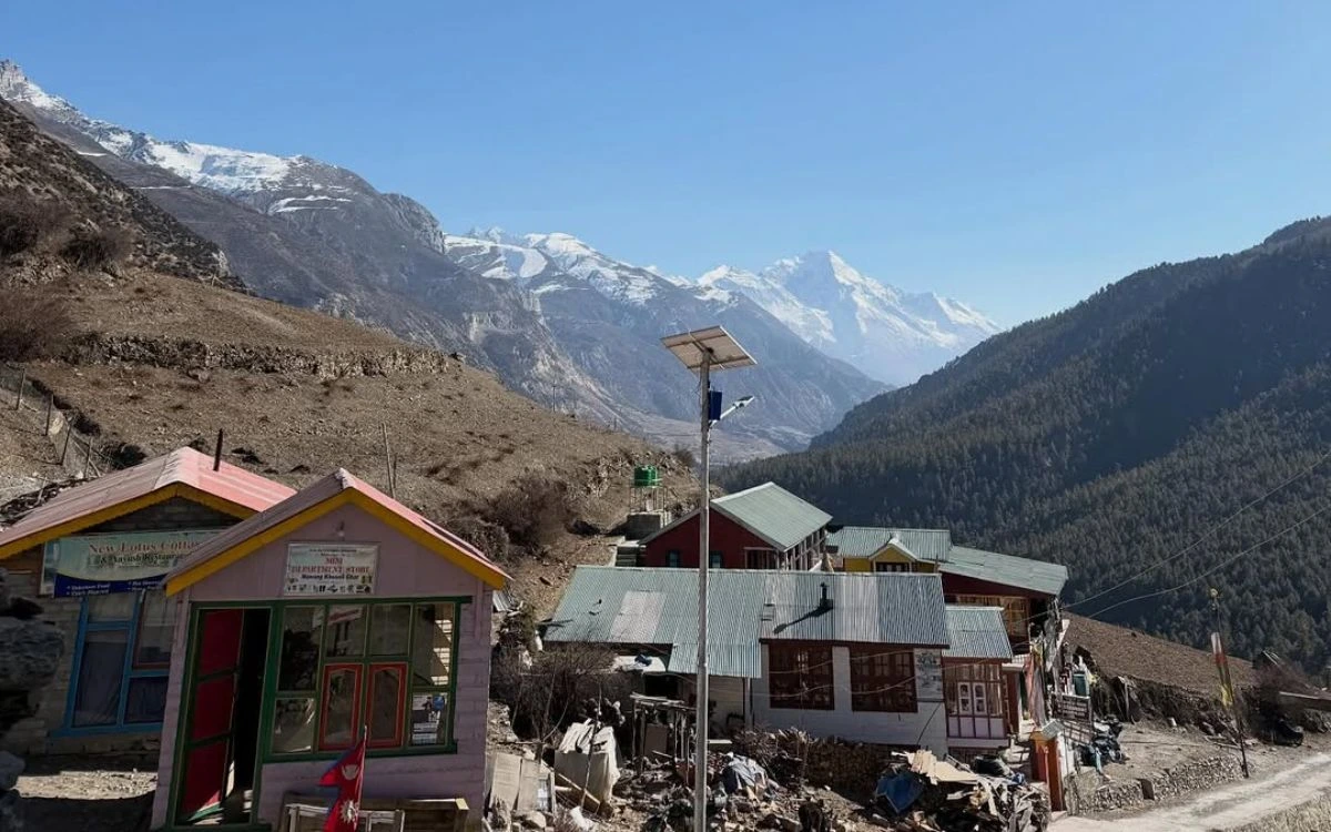 Colourful teahouse and guesthouse buildings in a remote Himalayan valley
