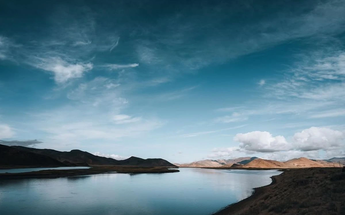 Lake Manasarovar winding through Tibet's arid hills