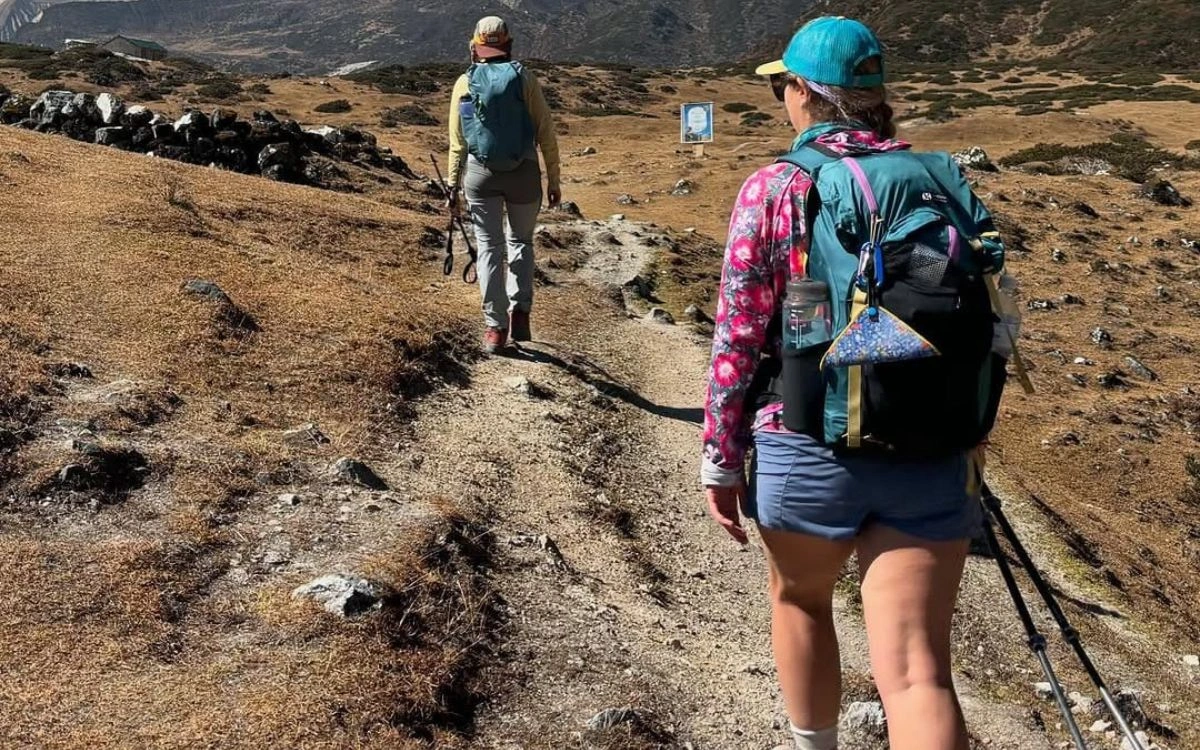Trekkers hiking along a high-altitude trail in the Manaslu region