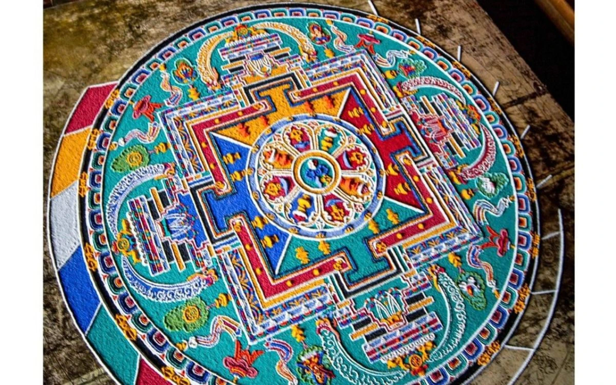 Colorful Buddhist sand mandala made by monks