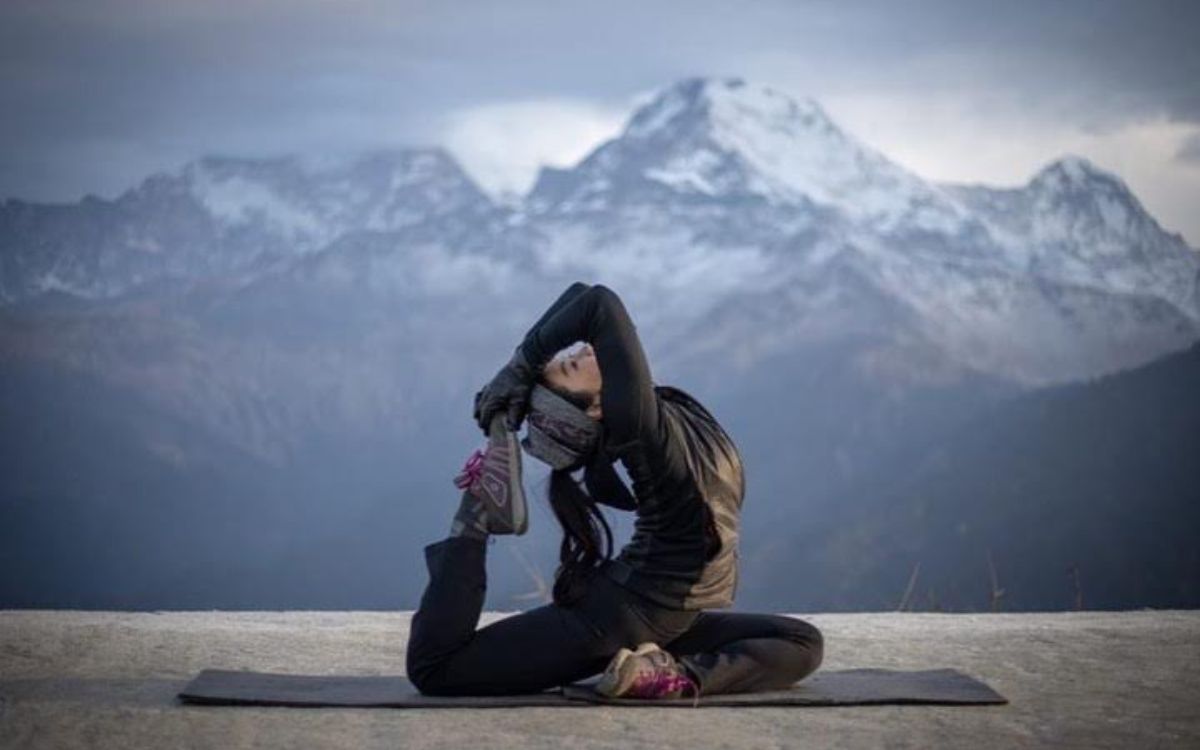 Yoga pose with Mardi Himal mountain