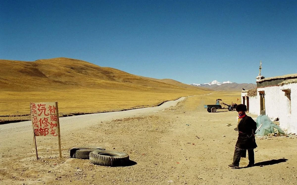 Local Tibetan boy on a roadside near the Kailash region