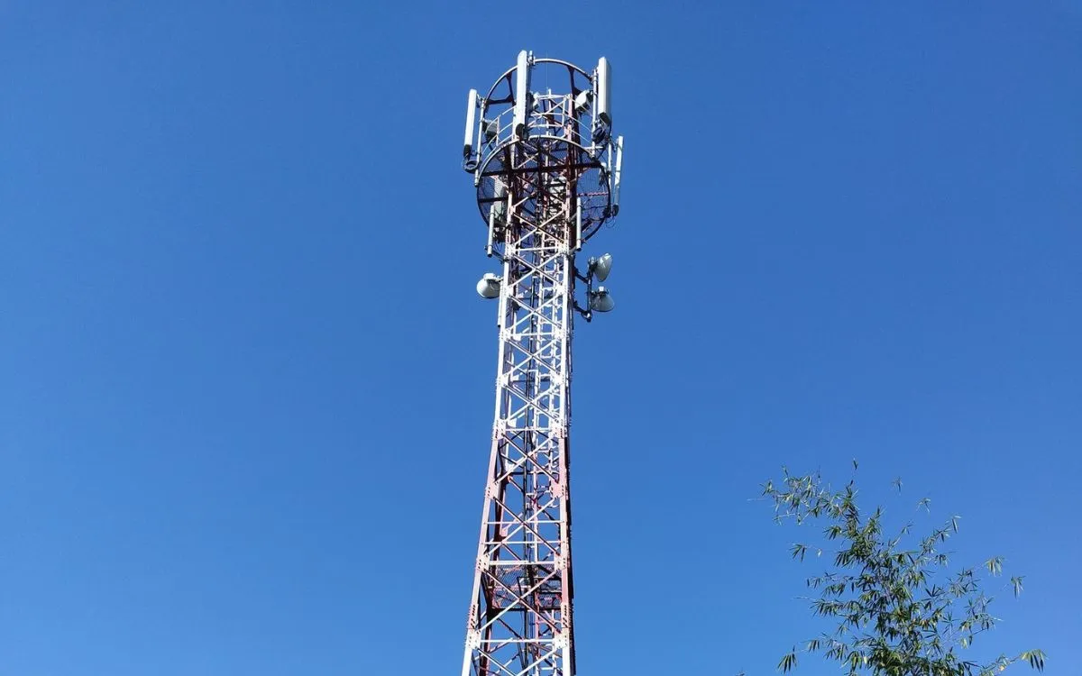 Mobile phone tower telecommunications infrastructure in Nepal providing network coverage in mountain region