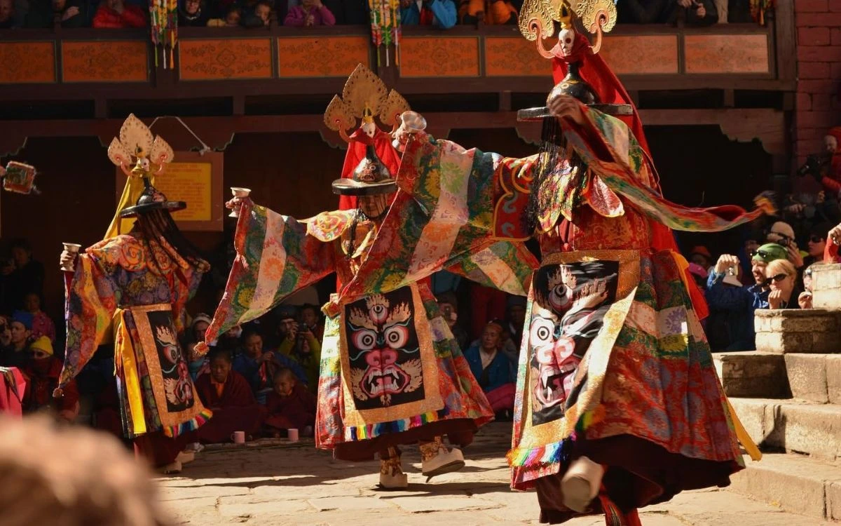 Masked lamas performing sacred dances at Mani Rimdu festival