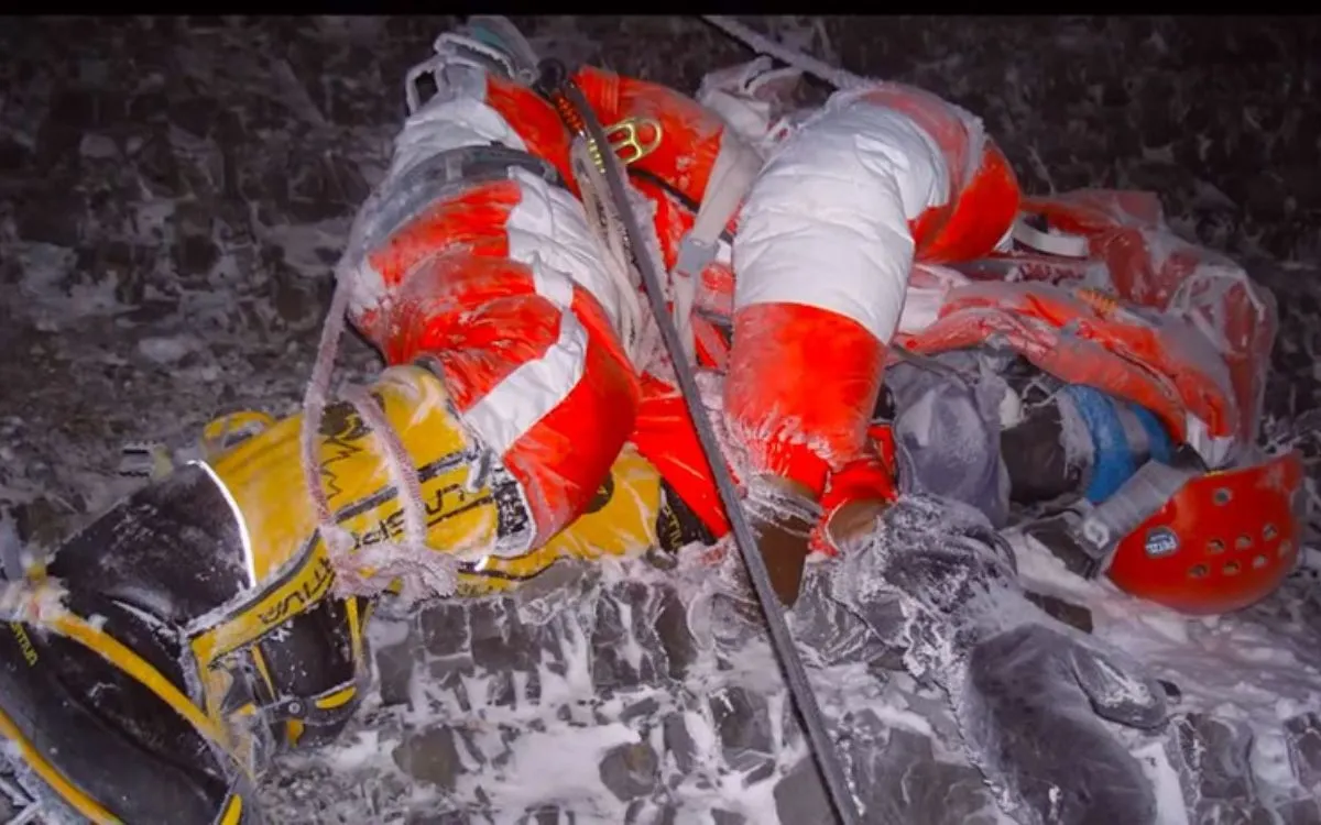 Deceased climber in Everest death zone above 8000 meters showing extreme high altitude mountaineering dangers