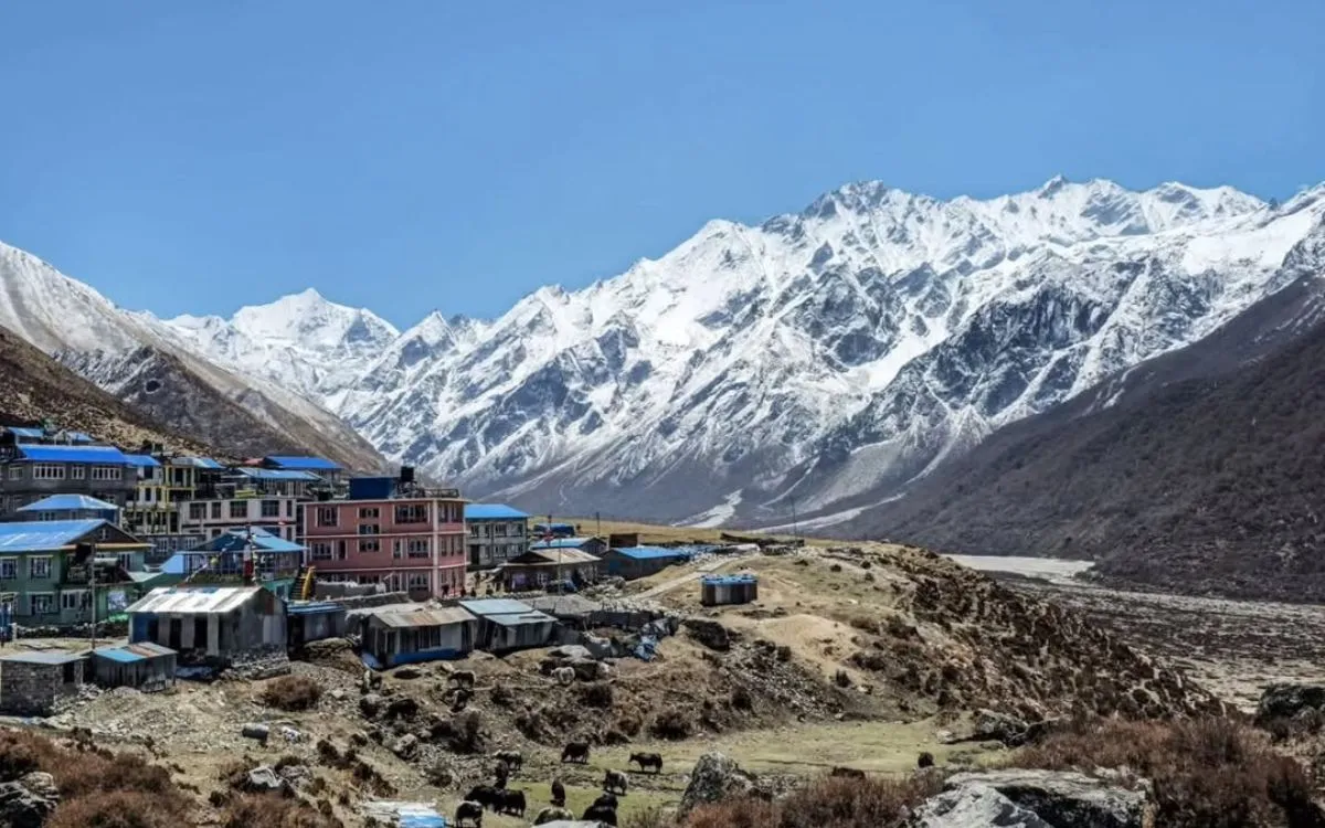 Kyanjin Gompa settlement surrounded by towering Himalayan mountains