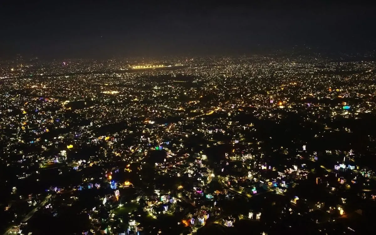 Kathmandu valley illuminated with thousands of lights and diyas during Tihar festival celebration at night aerial view