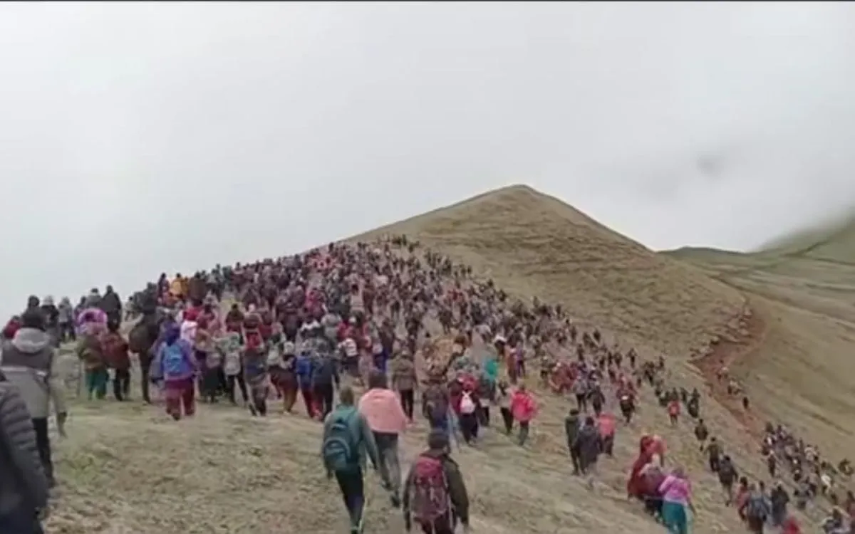 Large crowd of Yarshagumba harvesters on remote mountain slope