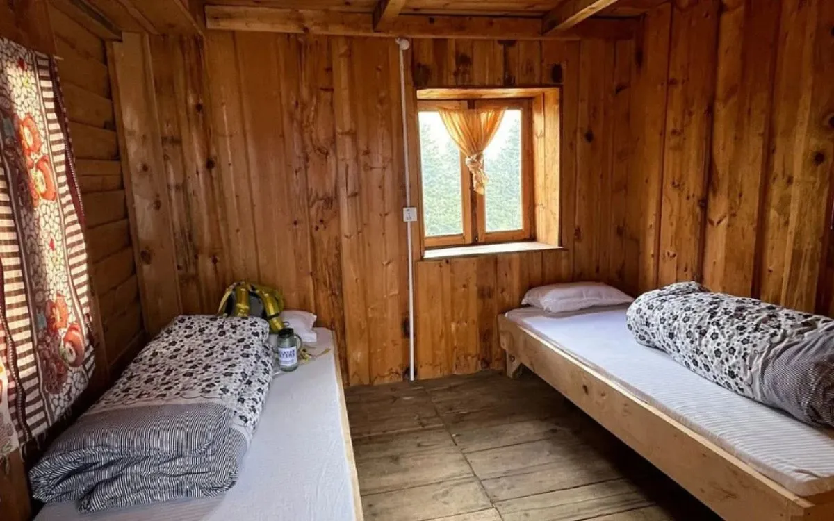 Wall socket in rustic wooden teahouse room in Nepal