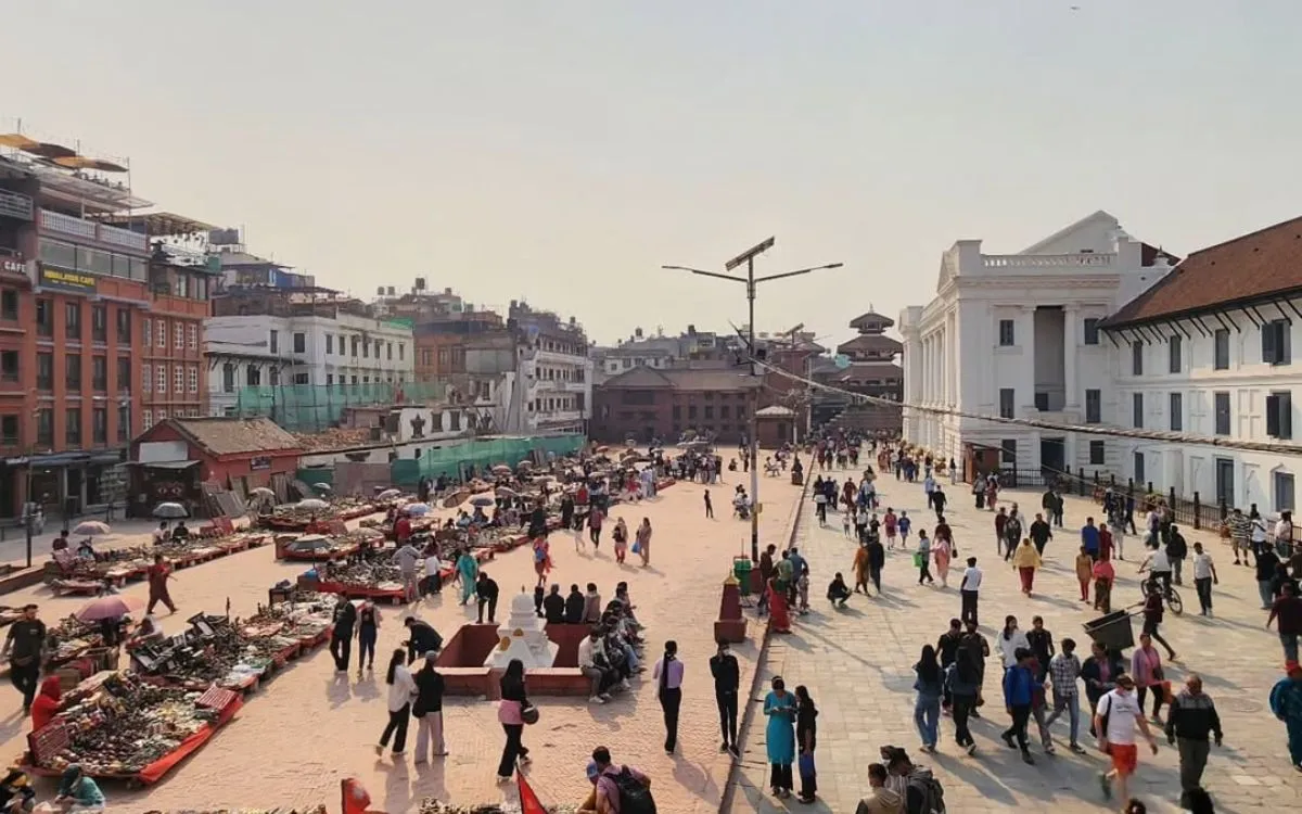 Overview of the square with people and market stalls