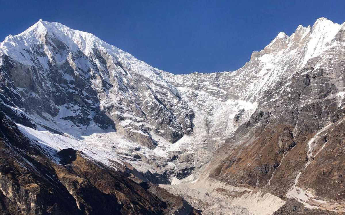 Close-up view of Langtang glacier and ice fall from Kyanjin Ri trekking route Nepal