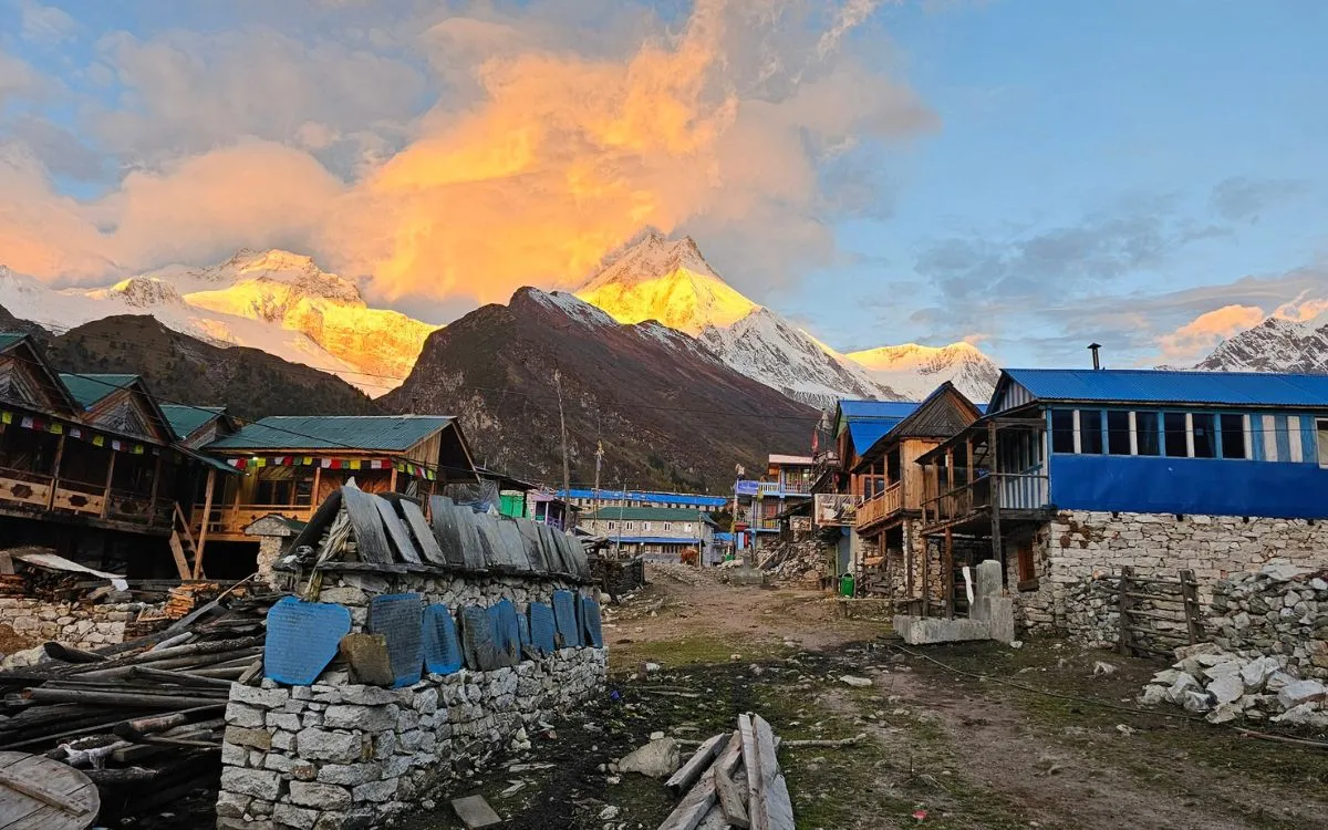 Mountain village lodges at sunset on Manaslu Circuit trek