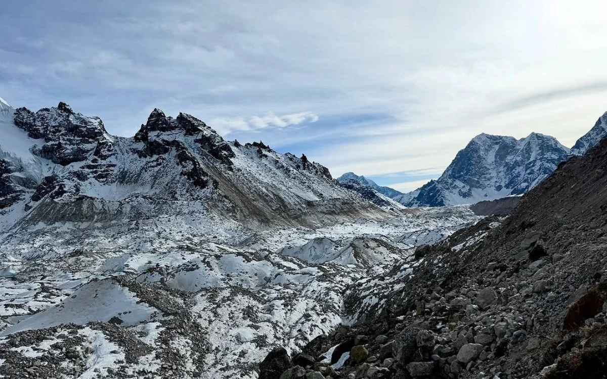 A vast snow-covered glacial landscape with jagged peaks in the Everest region of Nepal